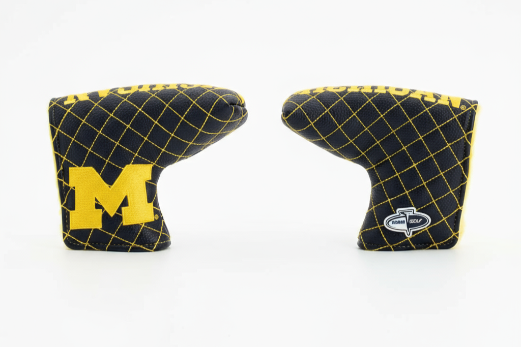 Two golf club covers with a grid pattern and 'M' logo on a white background