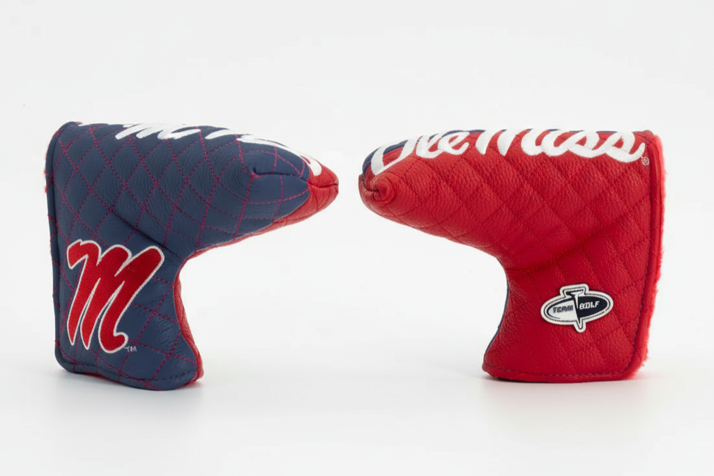 Two golf club covers, one blue and one red, on a white background.