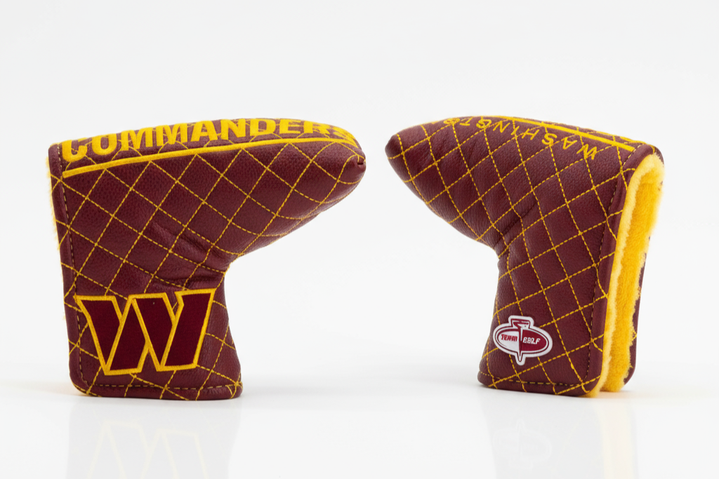 Two maroon and yellow golf club head covers with logos on a white background