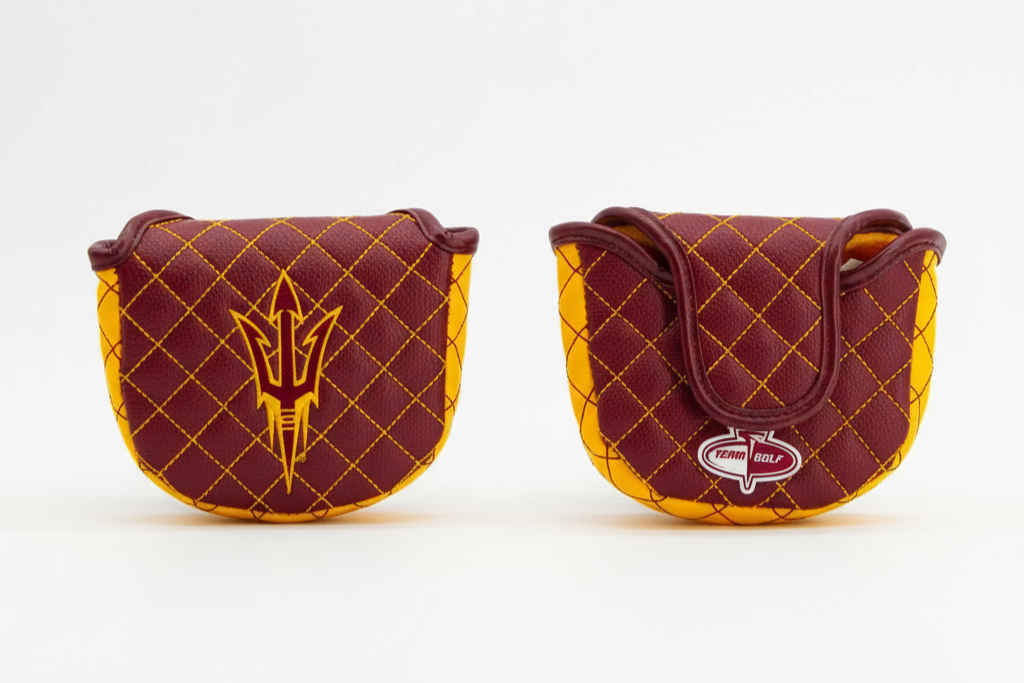 Two maroon and gold golf club covers on a white background