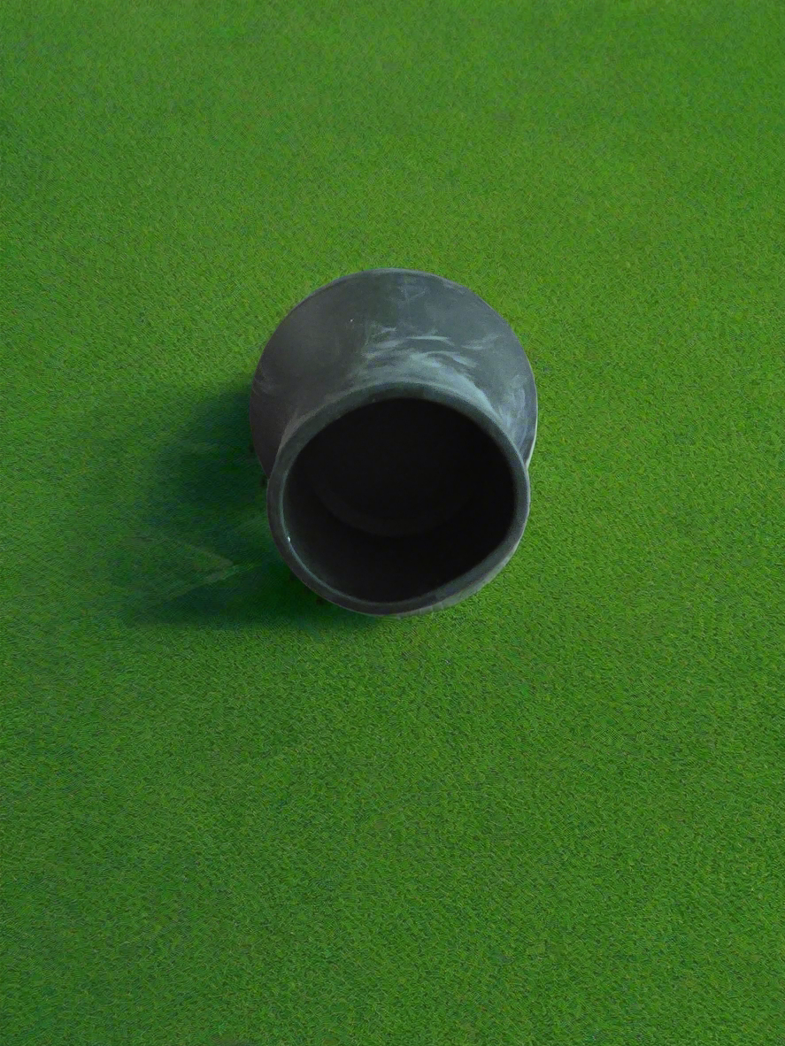 A black rubber golf ball pickup retriever
