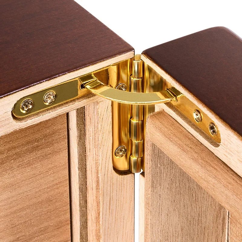 Close-up of gold-tone hinge hardware and cedar interior