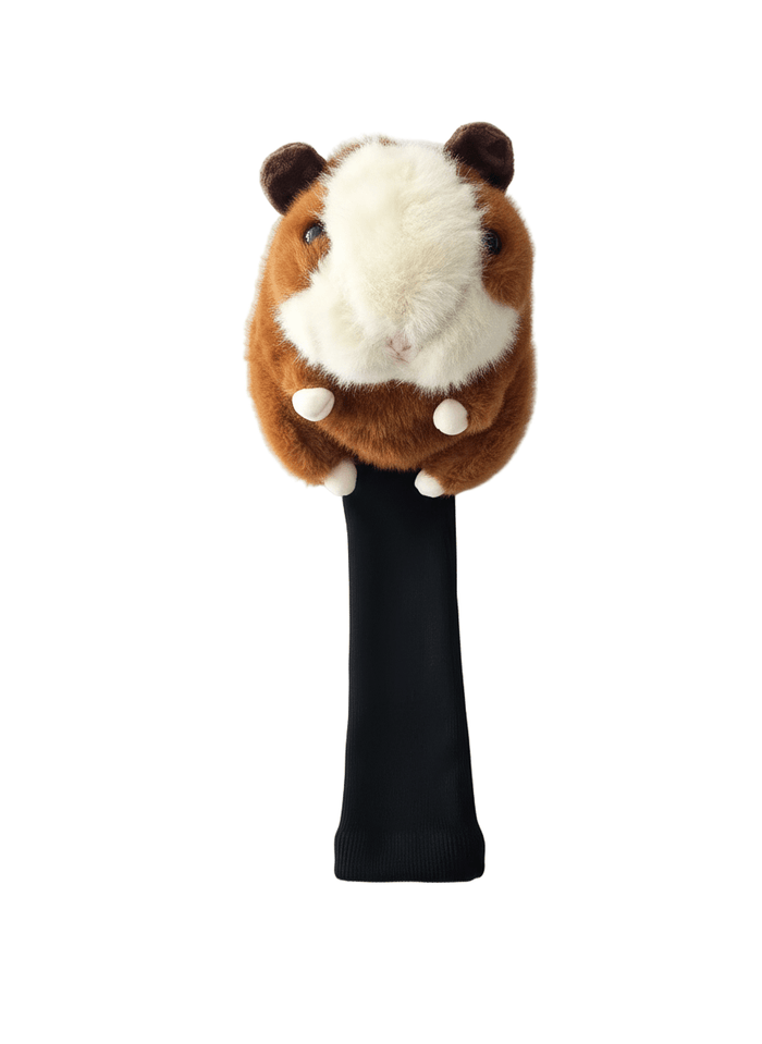 Plush toy resembling a hamster on a black stand against a white background