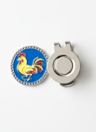 Decorative ball marker with rooster design on a white background