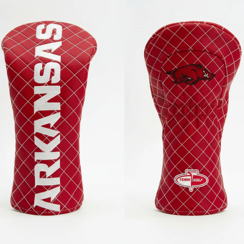 Two red golf club head covers with 'ARKANSAS' text and logo on a white background