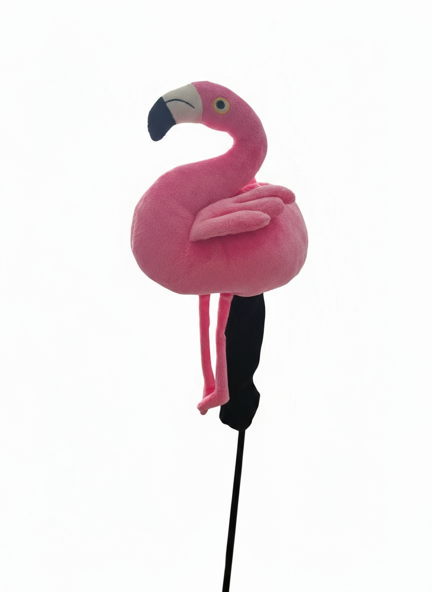Pink flamingo toy on a stick against a white background