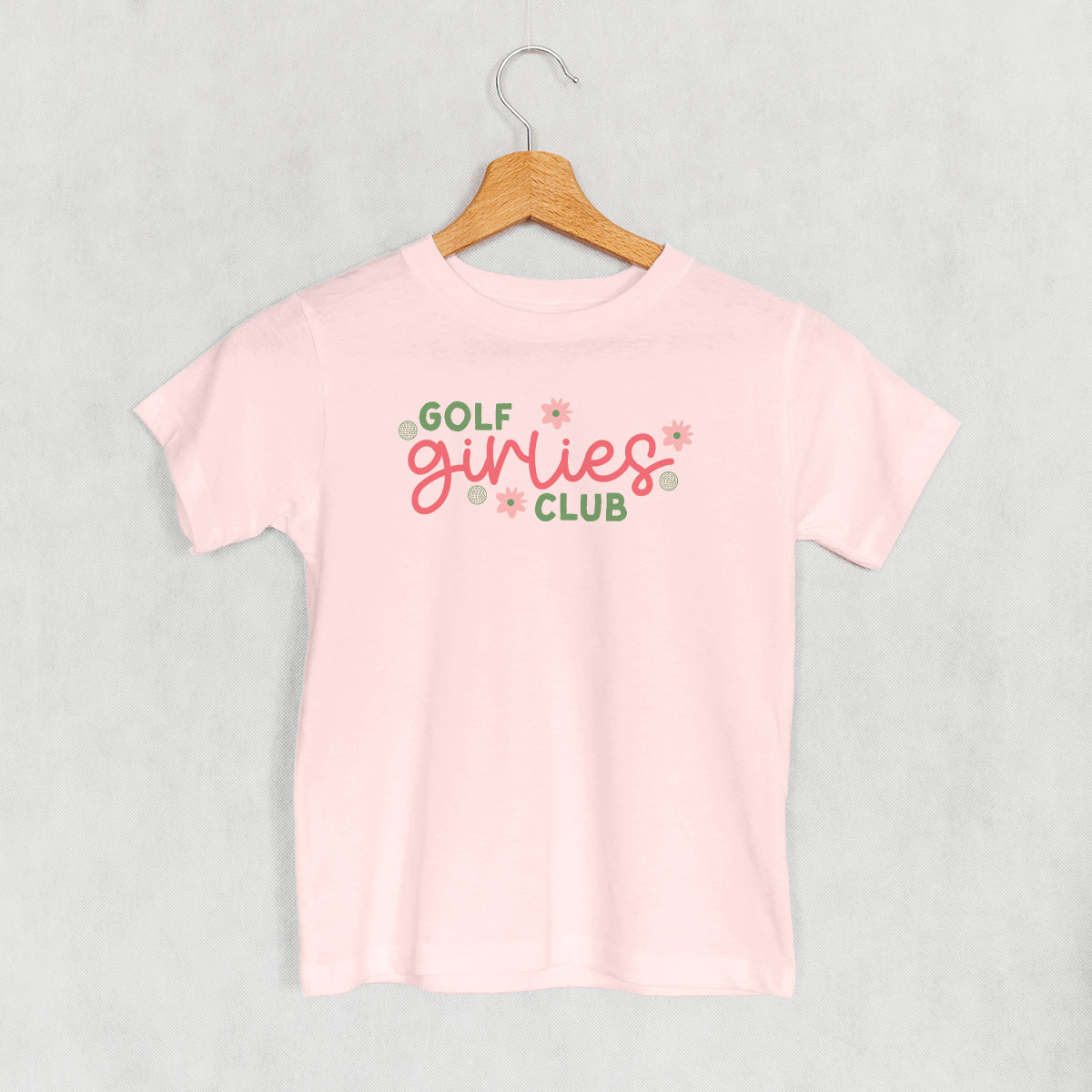 Pink Golf Girlies Club kids' T-shirt with pink and green lettering
