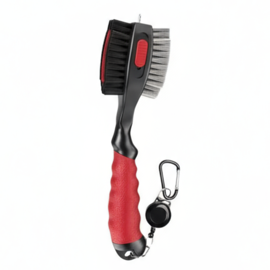 Cleaning brush with red handle and black bristles on a white background