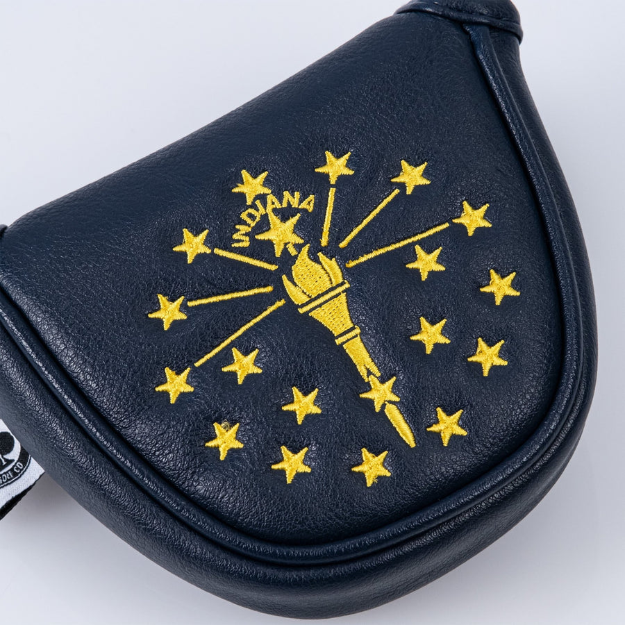 Gold torch and star embroidery on the navy Indiana mallet cover