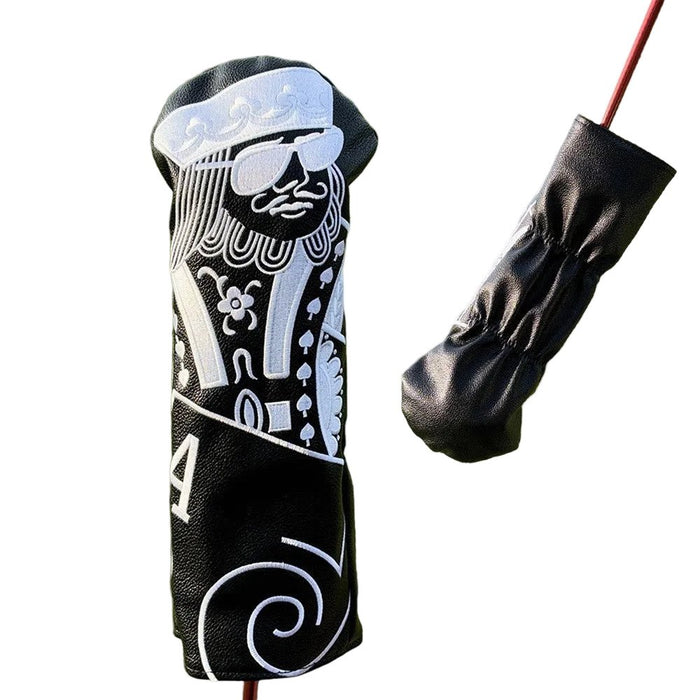 Black and white golf club head cover with intricate designs