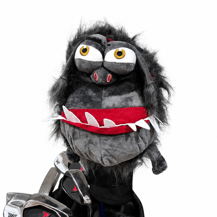 Golf club head cover with a cartoonish character design on a white background