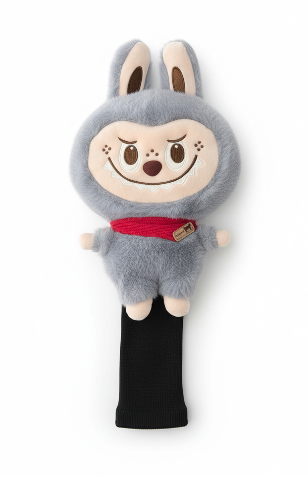 Gray plush toy with a red scarf on a white background