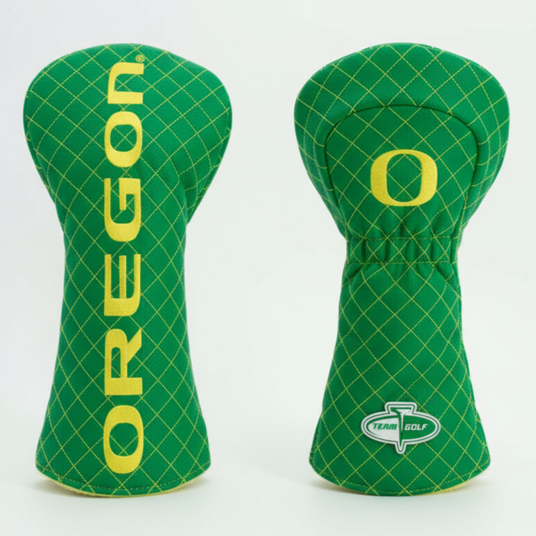 Two green golf club head covers with 'OREGON' and a logo on a white background