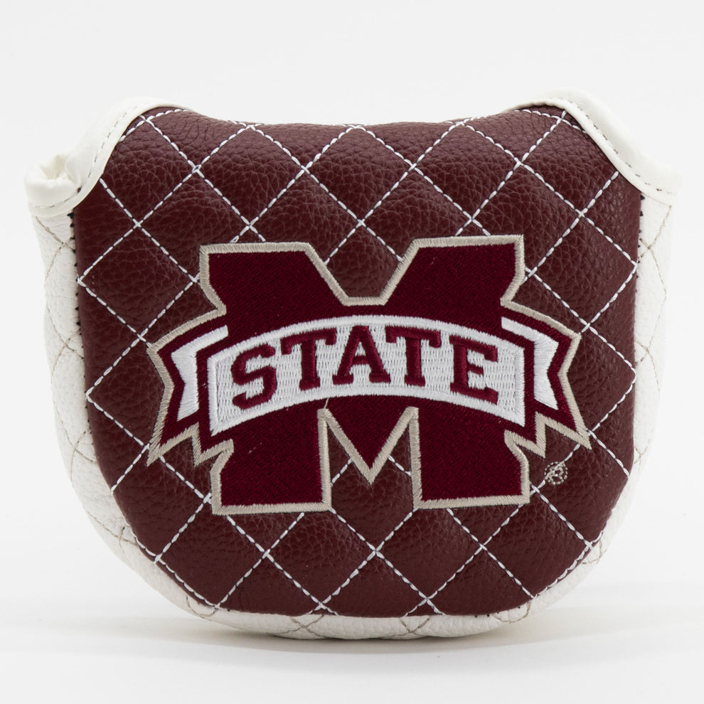 Quilted brown and white pillow with 'STATE' and 'M' logo on a white background