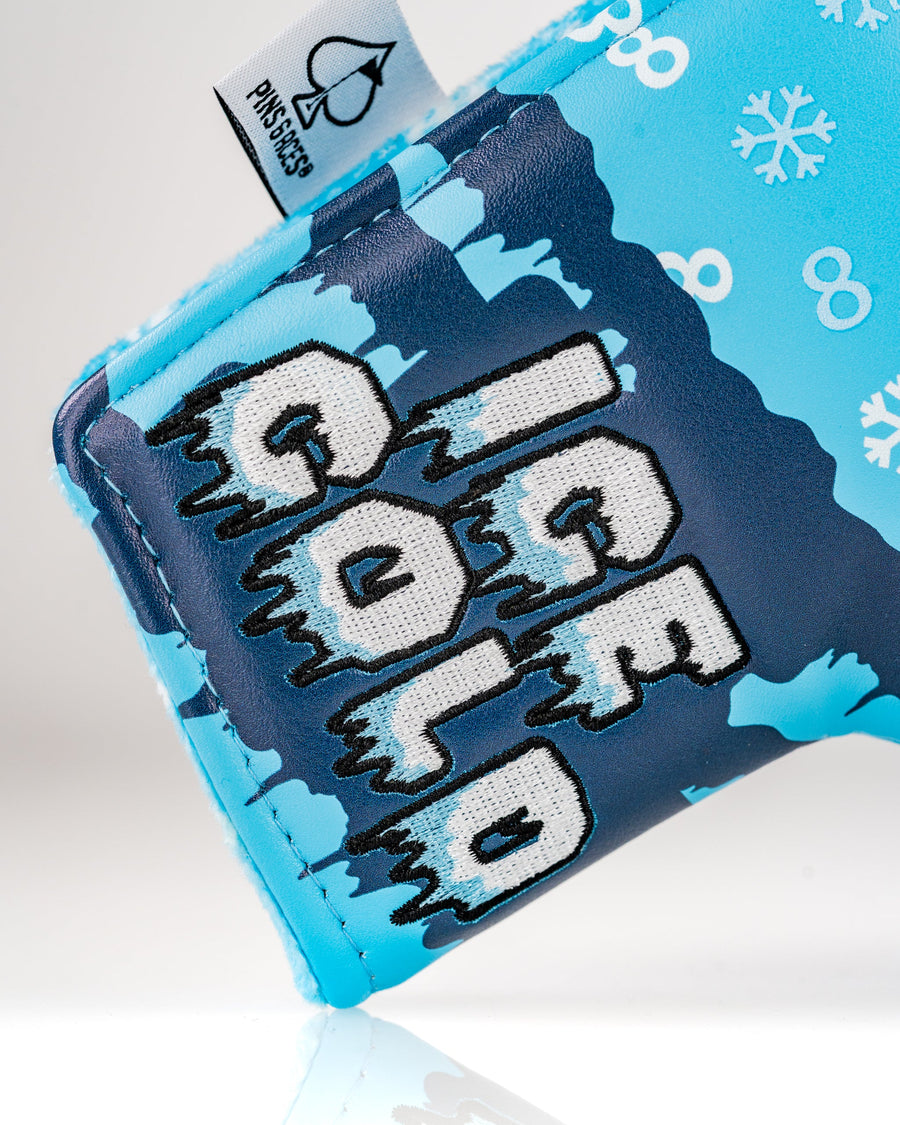 White Ice Cold embroidery over dark blue ice-like shapes