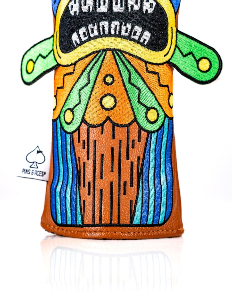 Orange wood-grain-style embroidery on lower Tiki cover