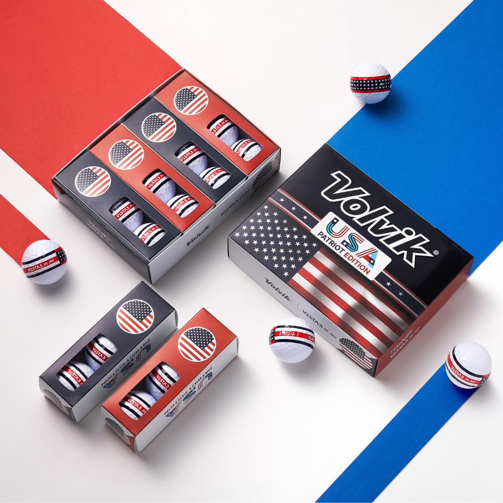 Volvik Vista3 USA Patriot Edition golf ball packaging on a colorful studio background