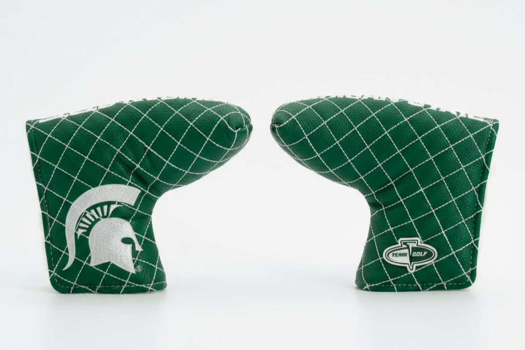 Two green grid-patterned golf club covers with logos on a white background