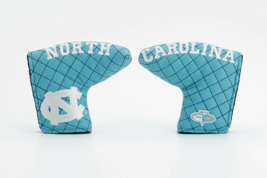 Two blue golf club head covers with 'North Carolina' text on a white background