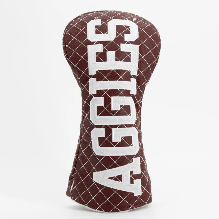 Golf club head cover with 'AGGIES' text on a white background