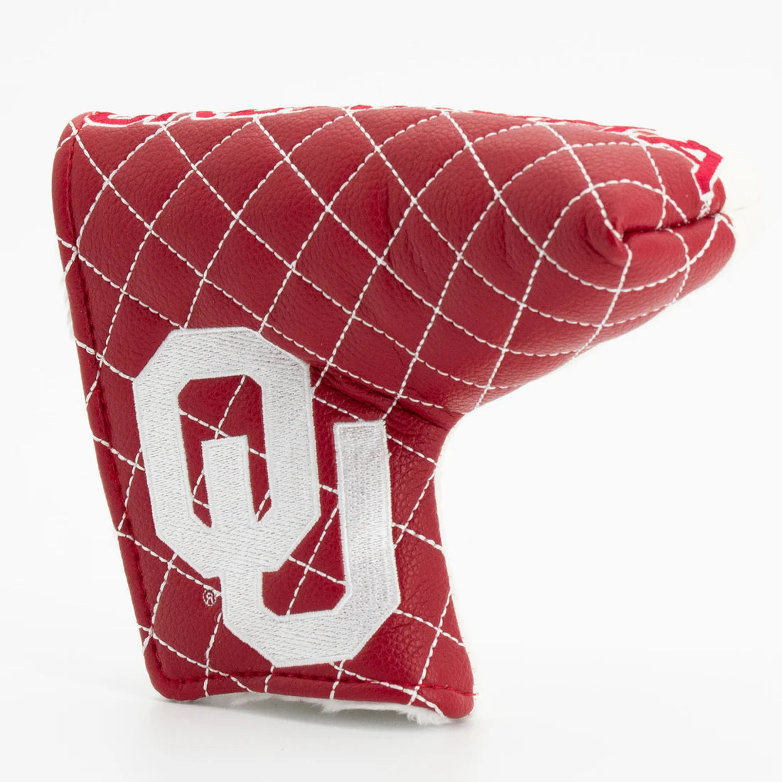 Red quilted golf club head cover with a white logo on a white background