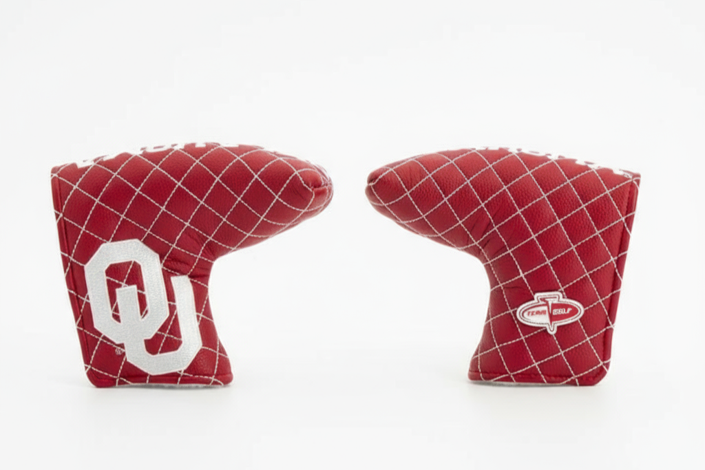 Two red quilted golf club covers with logos on a white background