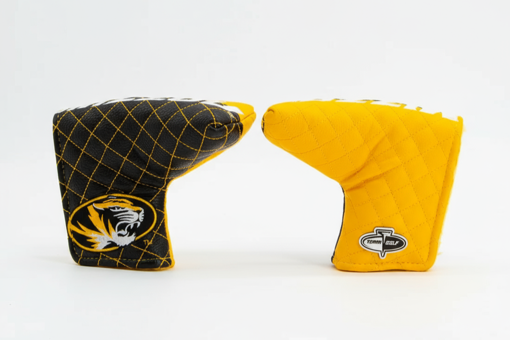Two golf club covers, one black with a yellow tiger logo and one yellow with a different logo, on a white background.