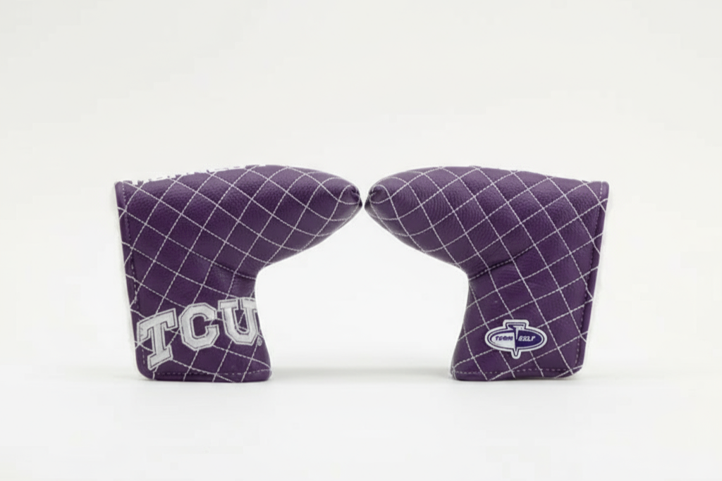 Two purple grid-patterned cornhole bags with 'TCU' and 'Cobra' logos on a white background