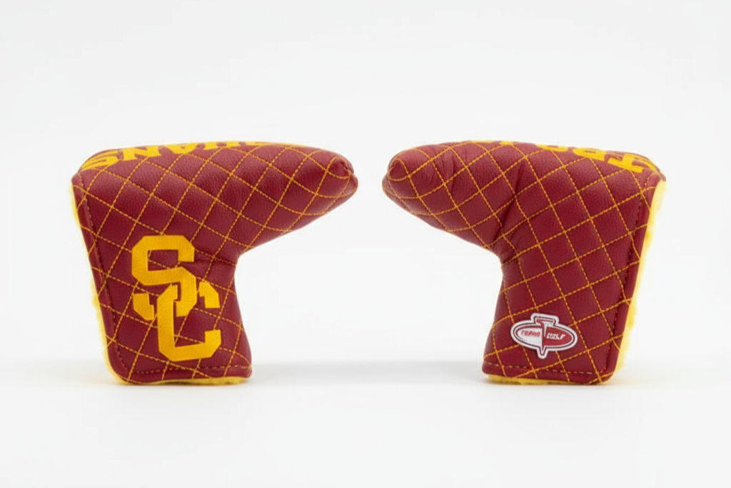 Two maroon and yellow golf club head covers with logos on a white background