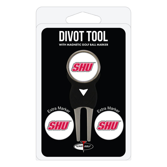 Sacred Heart Pioneers divot repair tool and three ball markers