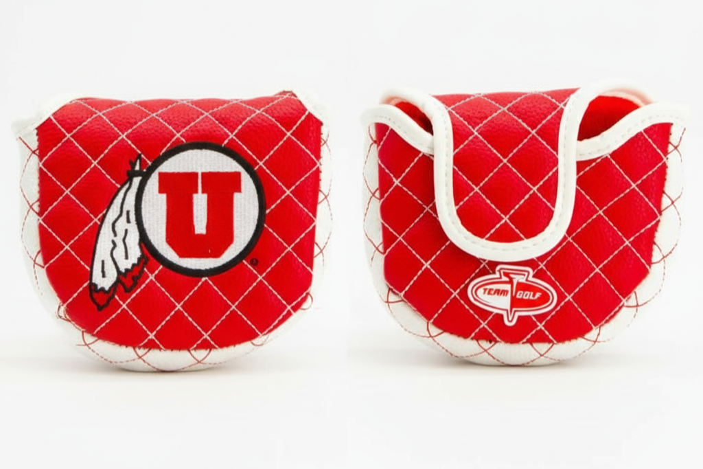 Two red golf club covers with logos on a white background