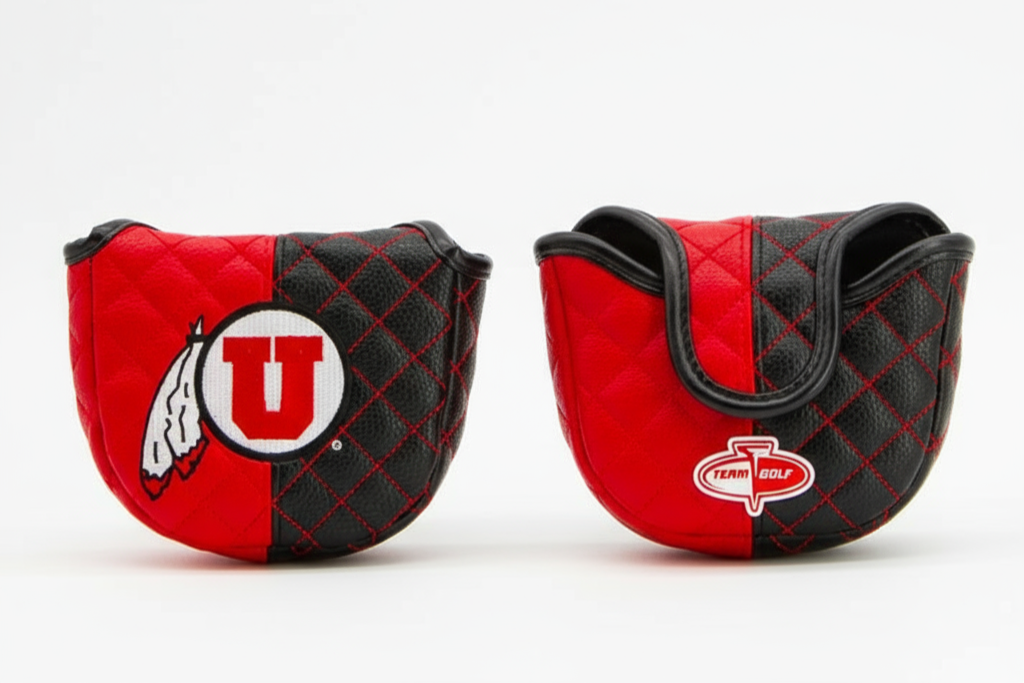 Two red and black golf club covers with logos on a white background