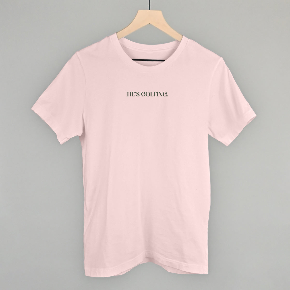 He's Golfing Graphic Apparel