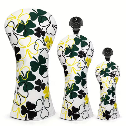 Golf club head covers with clover pattern on a white background