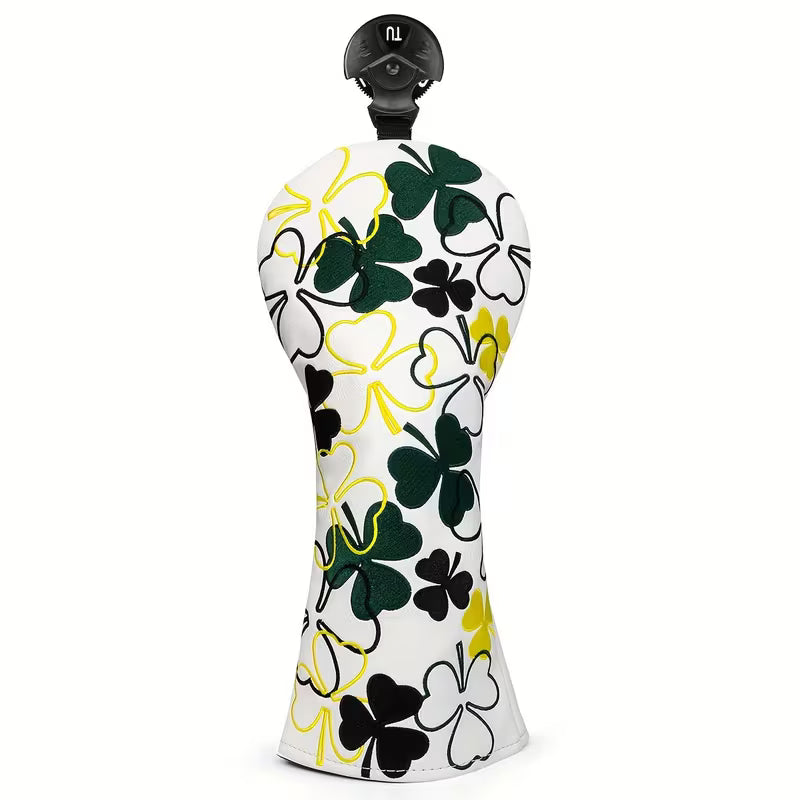 White dress form with black, green, and yellow floral pattern on a white background