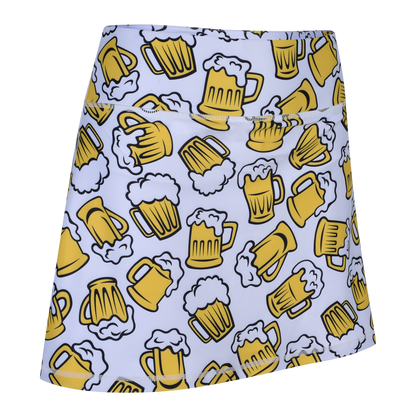 ReadyGOLF Beer Me women’s golf skort with yellow beer mugs on white