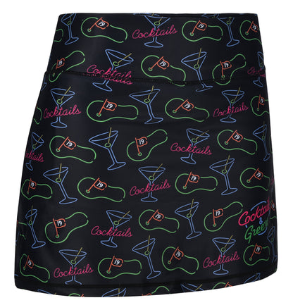 ReadyGOLF Cocktails & Greens women’s golf skort with cocktail-themed line art on a dark background
