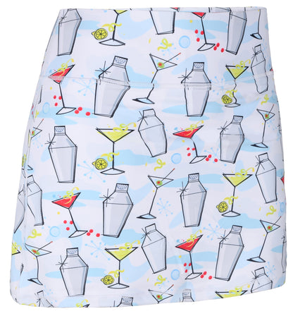 ReadyGOLF Shake It Up women’s golf skort with cocktail glasses and shakers on a pale background
