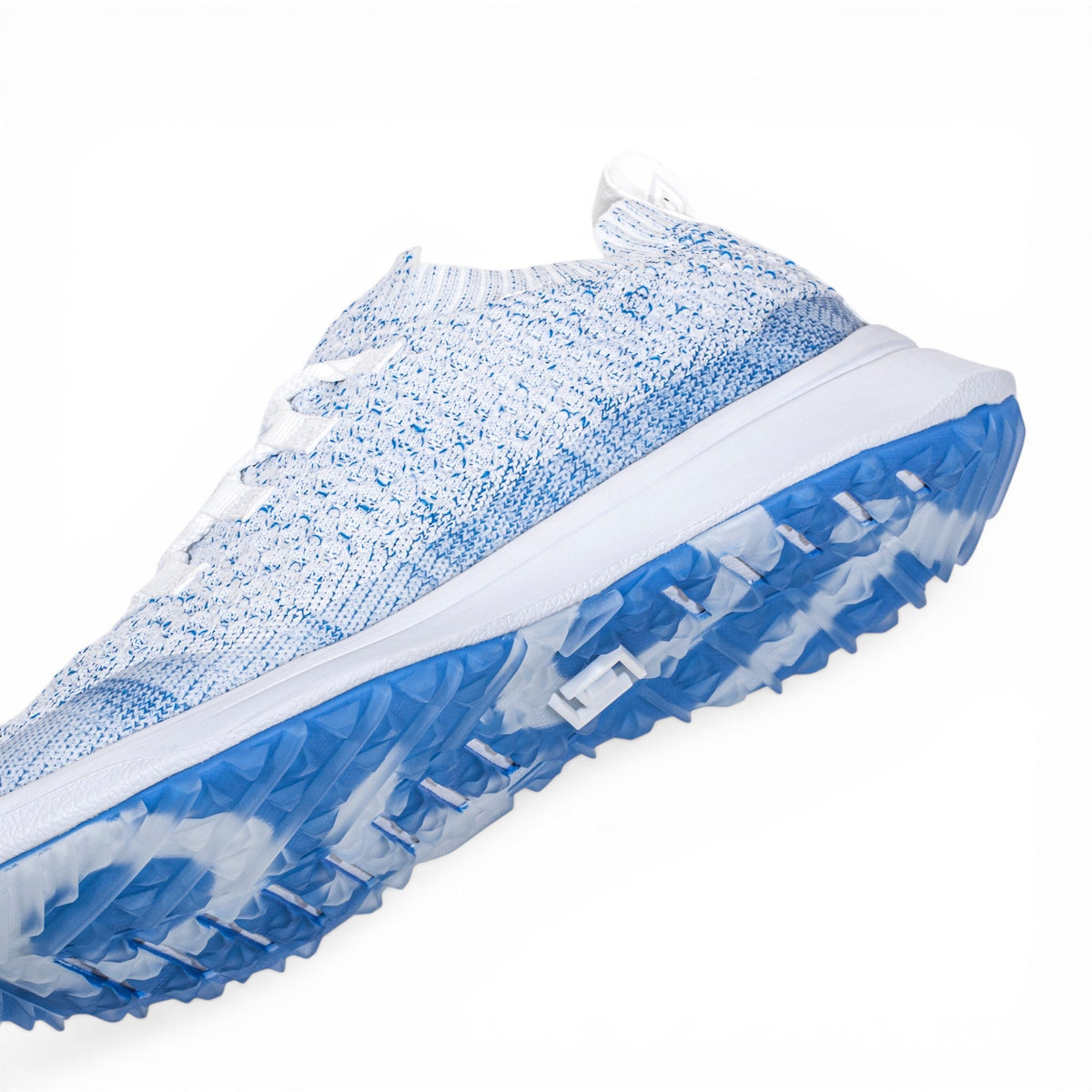 Tomo Bravo men's golf shoes in Sky Blue, angled view of the upper and outsole