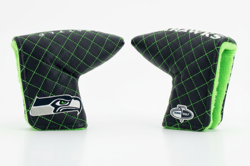 Two golf club head covers with a grid pattern and team logo on a white background