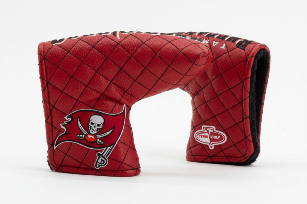 Red and black quilted golf club head cover with a logo on a white background