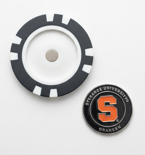 Black and white circular object with a logo on a light gray background