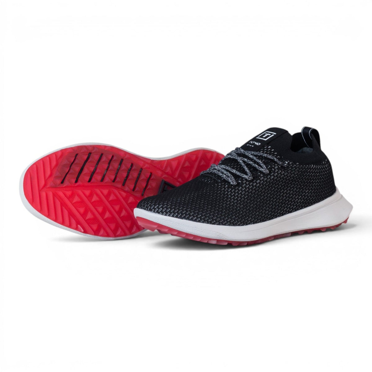 Tomo Alpha men's golf shoes in Carbon Black, pair showing the side and outsole