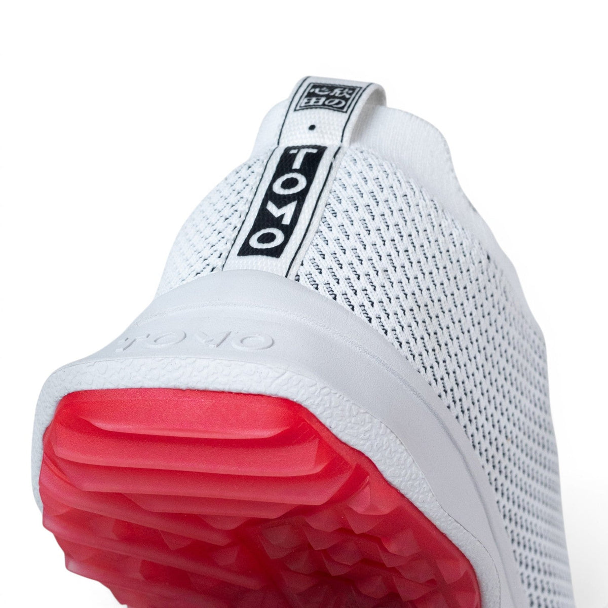 Tomo Alpha men's golf shoes in Oxygen White, heel and outsole detail