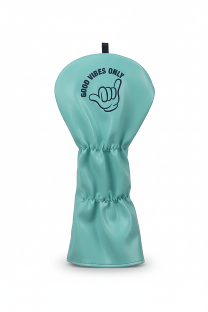 Turquoise golf club head cover with 'Good Vibes Only' text and hand symbol on a white background