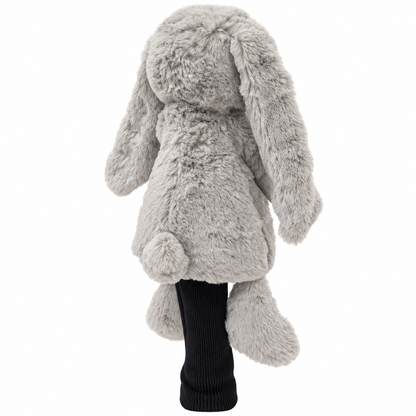 Rear view of plush bunny driver headcover showing fluffy tail and black sock