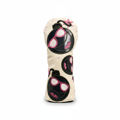 Golf club head cover with sunglasses design on grass