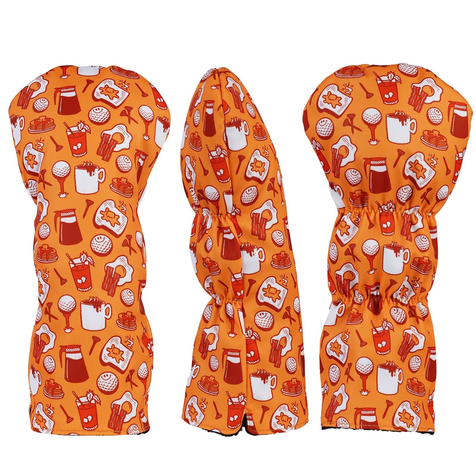 Three golf club heads with orange patterned covers on a white background
