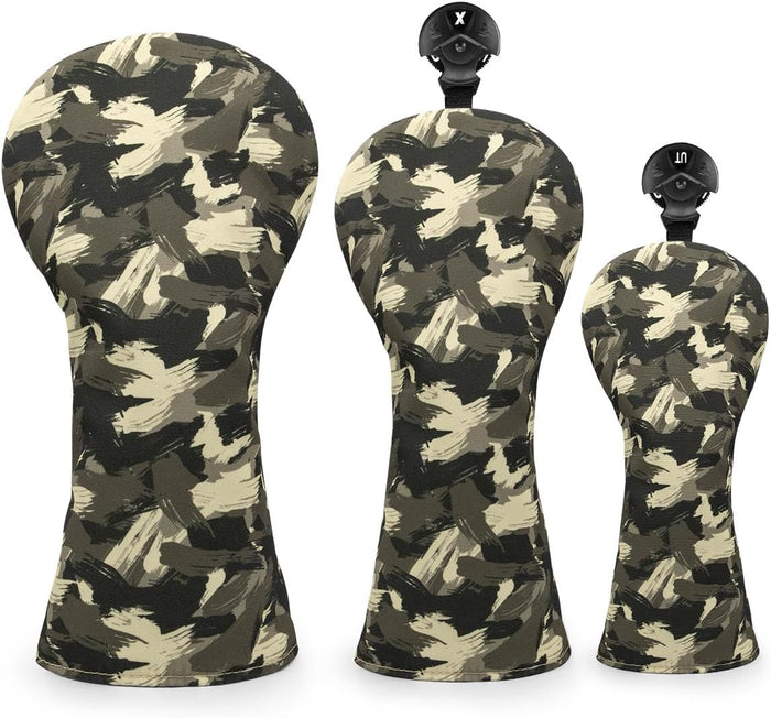 Three golf club head covers with camouflage pattern on a white background