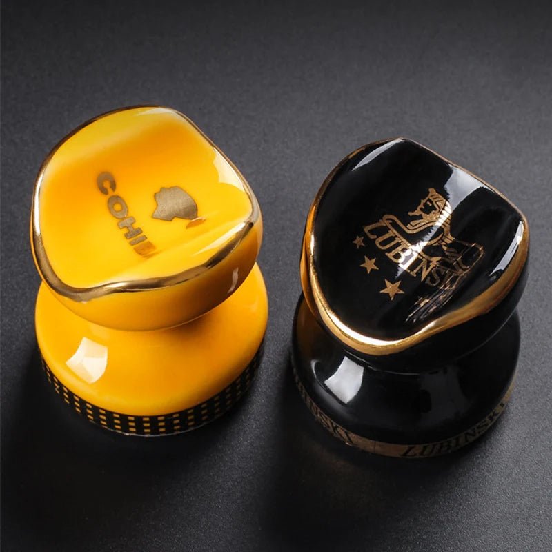 Yellow and black ceramic stands shown together on a dark background